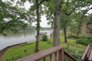 Nestled in the serene community of Hideaway Lake, this charming on Hide-A-Way Lake Golf Course in Texas - for sale on GolfHomes.com, golf home, golf lot