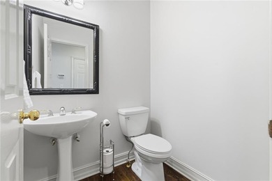 This three-sided brick traditional beauty delivers space, style on Polo Golf and Country Club in Georgia - for sale on GolfHomes.com, golf home, golf lot