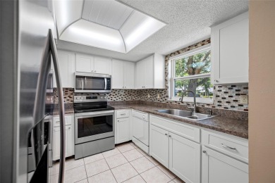 One or more photo(s) has been virtually staged. Stunning on East Lake Woodlands Country Club in Florida - for sale on GolfHomes.com, golf home, golf lot