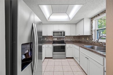 One or more photo(s) has been virtually staged. Stunning on East Lake Woodlands Country Club in Florida - for sale on GolfHomes.com, golf home, golf lot