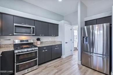 Immaculate south side Havasu home on a quiet street between the on London Bridge Golf Course in Arizona - for sale on GolfHomes.com, golf home, golf lot