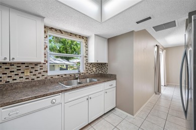 One or more photo(s) has been virtually staged. Stunning on East Lake Woodlands Country Club in Florida - for sale on GolfHomes.com, golf home, golf lot