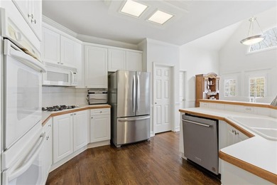 This three-sided brick traditional beauty delivers space, style on Polo Golf and Country Club in Georgia - for sale on GolfHomes.com, golf home, golf lot