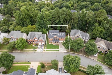 Fall in love with this stunning 5BR, 2.5BA gem in coveted on Highland Creek Golf Club in North Carolina - for sale on GolfHomes.com, golf home, golf lot