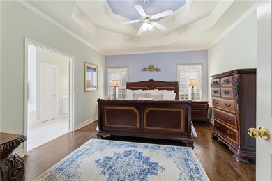 This three-sided brick traditional beauty delivers space, style on Polo Golf and Country Club in Georgia - for sale on GolfHomes.com, golf home, golf lot