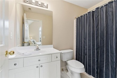 This three-sided brick traditional beauty delivers space, style on Polo Golf and Country Club in Georgia - for sale on GolfHomes.com, golf home, golf lot