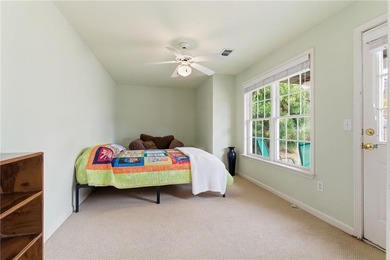 This three-sided brick traditional beauty delivers space, style on Polo Golf and Country Club in Georgia - for sale on GolfHomes.com, golf home, golf lot