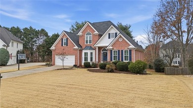This three-sided brick traditional beauty delivers space, style on Polo Golf and Country Club in Georgia - for sale on GolfHomes.com, golf home, golf lot
