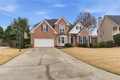 This three-sided brick traditional beauty delivers space, style on Polo Golf and Country Club in Georgia - for sale on GolfHomes.com, golf home, golf lot
