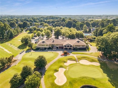 This three-sided brick traditional beauty delivers space, style on Polo Golf and Country Club in Georgia - for sale on GolfHomes.com, golf home, golf lot