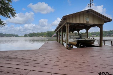 Nestled in the serene community of Hideaway Lake, this charming on Hide-A-Way Lake Golf Course in Texas - for sale on GolfHomes.com, golf home, golf lot