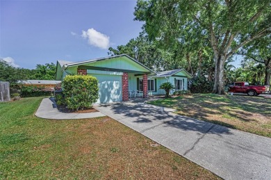 *Drop Anchor* in this beautiful home in Anchorage of Lake Tarpon on Lansbrook Golf Club in Florida - for sale on GolfHomes.com, golf home, golf lot