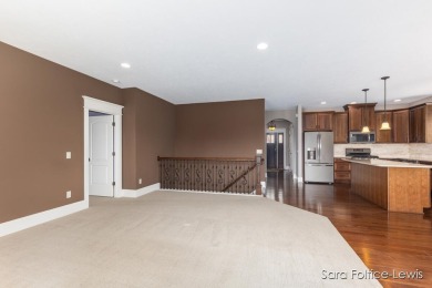 Welcome home! This beautiful custom condo in Andre's Crossing is on Sunnybrook Country Club in Michigan - for sale on GolfHomes.com, golf home, golf lot