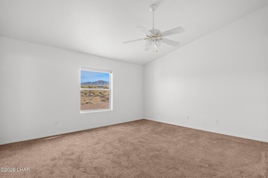 Located in a welcoming golf course community right off Route 66 on Valle Vista Golf Course in Arizona - for sale on GolfHomes.com, golf home, golf lot