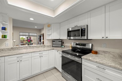 Stunning Pond & Golf Course Views from this AMAZING on Carrollwood Country Club in Florida - for sale on GolfHomes.com, golf home, golf lot