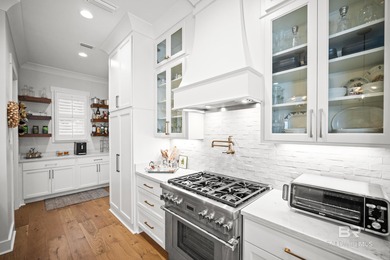 A Must See! Sought after Sweetwater Plan, beautiful L-shaped on Lakewood Golf Club in Alabama - for sale on GolfHomes.com, golf home, golf lot