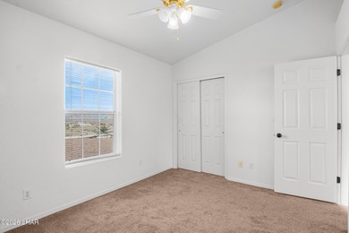 Located in a welcoming golf course community right off Route 66 on Valle Vista Golf Course in Arizona - for sale on GolfHomes.com, golf home, golf lot