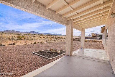 Located in a welcoming golf course community right off Route 66 on Valle Vista Golf Course in Arizona - for sale on GolfHomes.com, golf home, golf lot