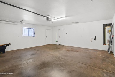 Located in a welcoming golf course community right off Route 66 on Valle Vista Golf Course in Arizona - for sale on GolfHomes.com, golf home, golf lot