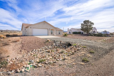 Located in a welcoming golf course community right off Route 66 on Valle Vista Golf Course in Arizona - for sale on GolfHomes.com, golf home, golf lot