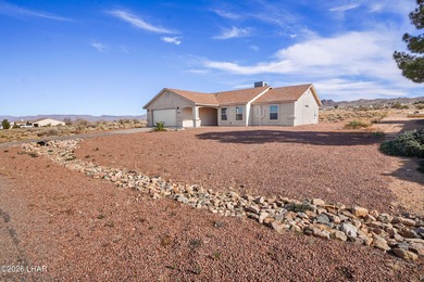 Located in a welcoming golf course community right off Route 66 on Valle Vista Golf Course in Arizona - for sale on GolfHomes.com, golf home, golf lot