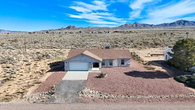 Located in a welcoming golf course community right off Route 66 on Valle Vista Golf Course in Arizona - for sale on GolfHomes.com, golf home, golf lot