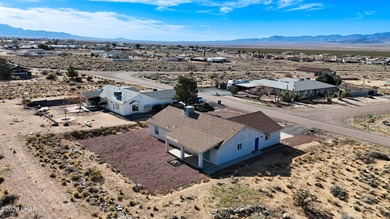 Located in a welcoming golf course community right off Route 66 on Valle Vista Golf Course in Arizona - for sale on GolfHomes.com, golf home, golf lot