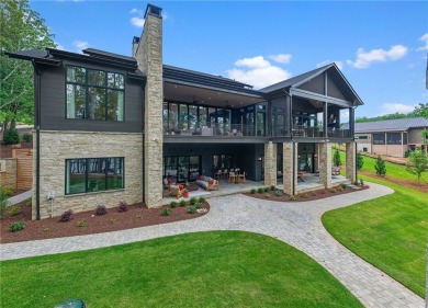 Welcome to an extraordinary lakefront retreat in the prestigious on The Cliffs At Keowee Springs in South Carolina - for sale on GolfHomes.com, golf home, golf lot