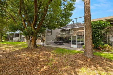 Stunning Pond & Golf Course Views from this AMAZING on Carrollwood Country Club in Florida - for sale on GolfHomes.com, golf home, golf lot