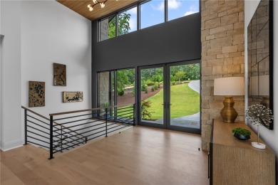 Welcome to an extraordinary lakefront retreat in the prestigious on The Cliffs At Keowee Springs in South Carolina - for sale on GolfHomes.com, golf home, golf lot