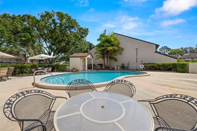 Stunning Pond & Golf Course Views from this AMAZING on Carrollwood Country Club in Florida - for sale on GolfHomes.com, golf home, golf lot