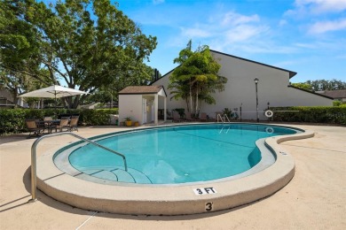 Stunning Pond & Golf Course Views from this AMAZING on Carrollwood Country Club in Florida - for sale on GolfHomes.com, golf home, golf lot