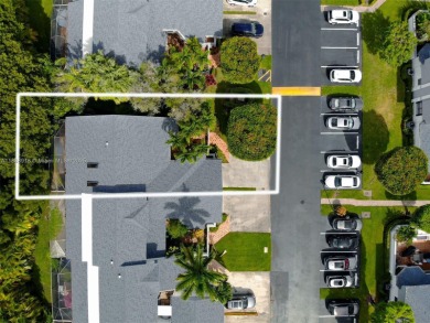 Charming and impeccably maintained 2-bedroom, 2-bath townhouse on Jim McLean Signature Course in Florida - for sale on GolfHomes.com, golf home, golf lot