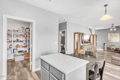 Welcome to this spacious two-story home that has it all! From on The Golf Club At Johnson Ranch in Arizona - for sale on GolfHomes.com, golf home, golf lot