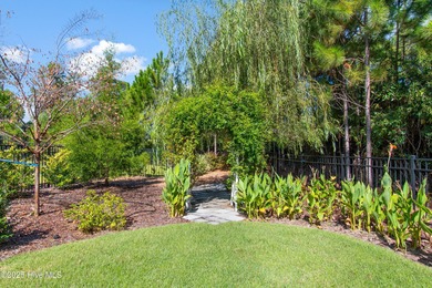 Welcome to 3132 Inland Cove, a charming custom coastal cottage on Members Club At St. James Plantation in North Carolina - for sale on GolfHomes.com, golf home, golf lot