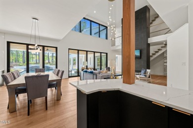 Step into elevated luxury in this custom-built masterpiece on North Ridge Country Club in North Carolina - for sale on GolfHomes.com, golf home, golf lot