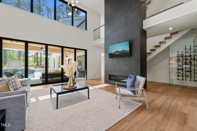 Step into elevated luxury in this custom-built masterpiece on North Ridge Country Club in North Carolina - for sale on GolfHomes.com, golf home, golf lot