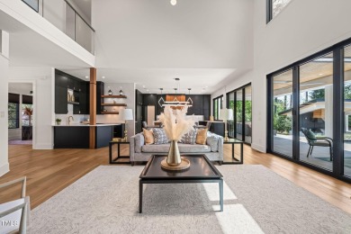 Step into elevated luxury in this custom-built masterpiece on North Ridge Country Club in North Carolina - for sale on GolfHomes.com, golf home, golf lot