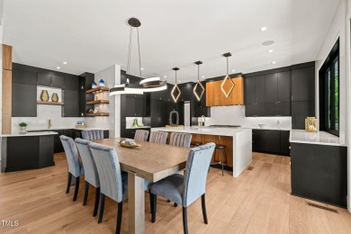 Step into elevated luxury in this custom-built masterpiece on North Ridge Country Club in North Carolina - for sale on GolfHomes.com, golf home, golf lot