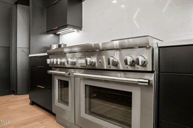 Step into elevated luxury in this custom-built masterpiece on North Ridge Country Club in North Carolina - for sale on GolfHomes.com, golf home, golf lot