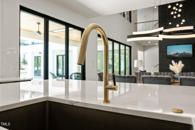 Step into elevated luxury in this custom-built masterpiece on North Ridge Country Club in North Carolina - for sale on GolfHomes.com, golf home, golf lot