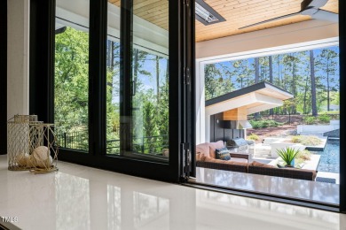 Step into elevated luxury in this custom-built masterpiece on North Ridge Country Club in North Carolina - for sale on GolfHomes.com, golf home, golf lot