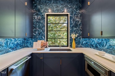 Step into elevated luxury in this custom-built masterpiece on North Ridge Country Club in North Carolina - for sale on GolfHomes.com, golf home, golf lot