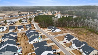 Welcome to the thoughtfully designed Litchfield II, a 3-bedroom on Brunswick Plantation and Golf Resorts in North Carolina - for sale on GolfHomes.com, golf home, golf lot