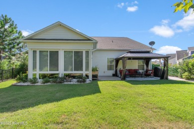 Welcome to 3132 Inland Cove, a charming custom coastal cottage on Members Club At St. James Plantation in North Carolina - for sale on GolfHomes.com, golf home, golf lot
