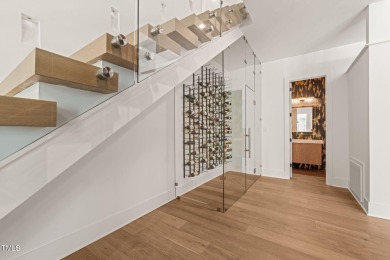 Step into elevated luxury in this custom-built masterpiece on North Ridge Country Club in North Carolina - for sale on GolfHomes.com, golf home, golf lot