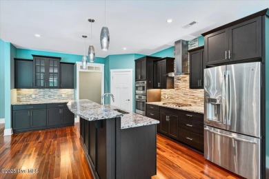Experience the pinnacle of luxury living in this exquisite 4,200 on Members Club At St. James Plantation in North Carolina - for sale on GolfHomes.com, golf home, golf lot