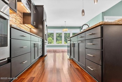 Experience the pinnacle of luxury living in this exquisite 4,200 on Members Club At St. James Plantation in North Carolina - for sale on GolfHomes.com, golf home, golf lot