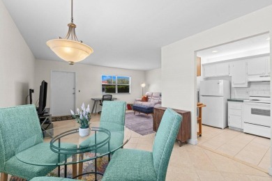 Step inside this charming ground-floor villa featuring 1 bedroom on Kings Point Golf - Executive in Florida - for sale on GolfHomes.com, golf home, golf lot