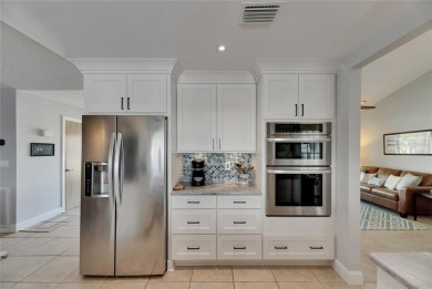 APOLLO BEACH WATERFRONT - UPDATED CUSTOM-BUILT EXECUTIVE HOME - on Apollo Beach Golf and Sea Club in Florida - for sale on GolfHomes.com, golf home, golf lot